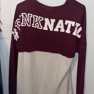 medium pink sweater half maroon half white